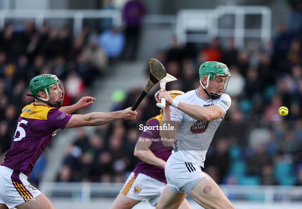 18 April 2026; Jack Sheridan of Kildare gets a shot away despite the attention of Richie Lawlor of Wexford during the Leinster GAA Senior Hurling Championship Round 1 match between Kildare and Wexford at Cedral St Conleth's Park in Newbridge, Kildare. Photo by Michael P Ryan/Sportsfile
