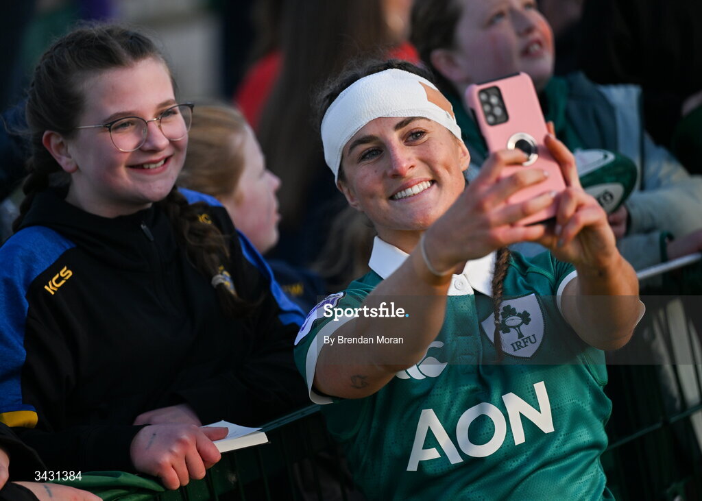 18 April 2026; Emily Lane of Ireland takes a selfie with a supporter after the Women's Six Nations Rugby Championship match between Ireland and Italy at Dexcom Stadium in Galway. Photo by Brendan Moran/Sportsfile