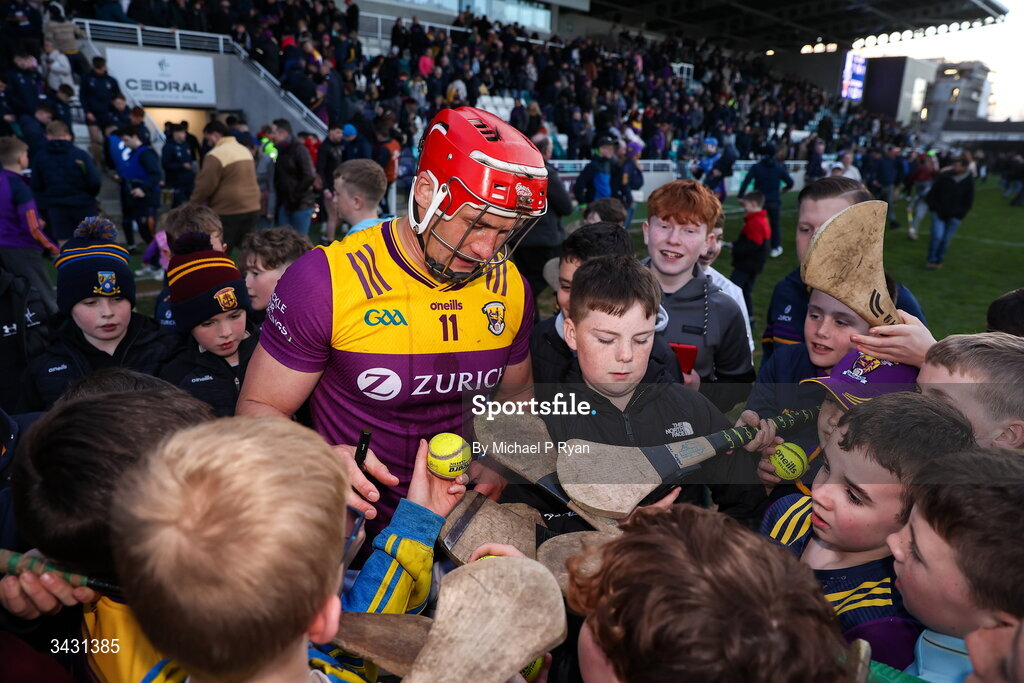18 April 2026; Lee Chin of Wexford signs autographs for young supporters after the Leinster GAA Senior Hurling Championship Round 1 match between Kildare and Wexford at Cedral St Conleth's Park in Newbridge, Kildare. Photo by Michael P Ryan/Sportsfile