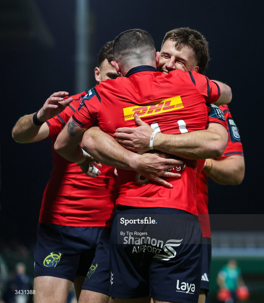 18 April 2026; Alex Nankivell of Munster congratulates Calvin Nash on scoring a first try during the United Rugby Championship match between Benetton and Munster at Stadio Monigo in Treviso, Italy. Photo by Tim Rogers/Sportsfile