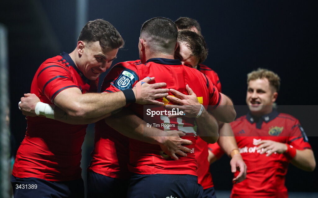 18 April 2026; Calvin Nash of Munster is congratulated by teammates after scoring their first try during the United Rugby Championship match between Benetton and Munster at Stadio Monigo in Treviso, Italy. Photo by Tim Rogers/Sportsfile