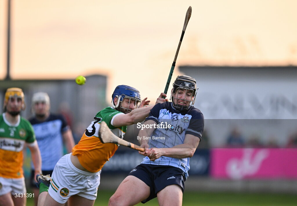 18 April 2026; Dónal Burke of Dublin scores a point to level the game late on despite the efforts of Jack Clancy of Offaly during the Leinster GAA Senior Hurling Championship Round 1 match between Offaly and Dublin at Glenisk O'Connor Park in Tullamore, Offaly. Photo by Sam Barnes/Sportsfile