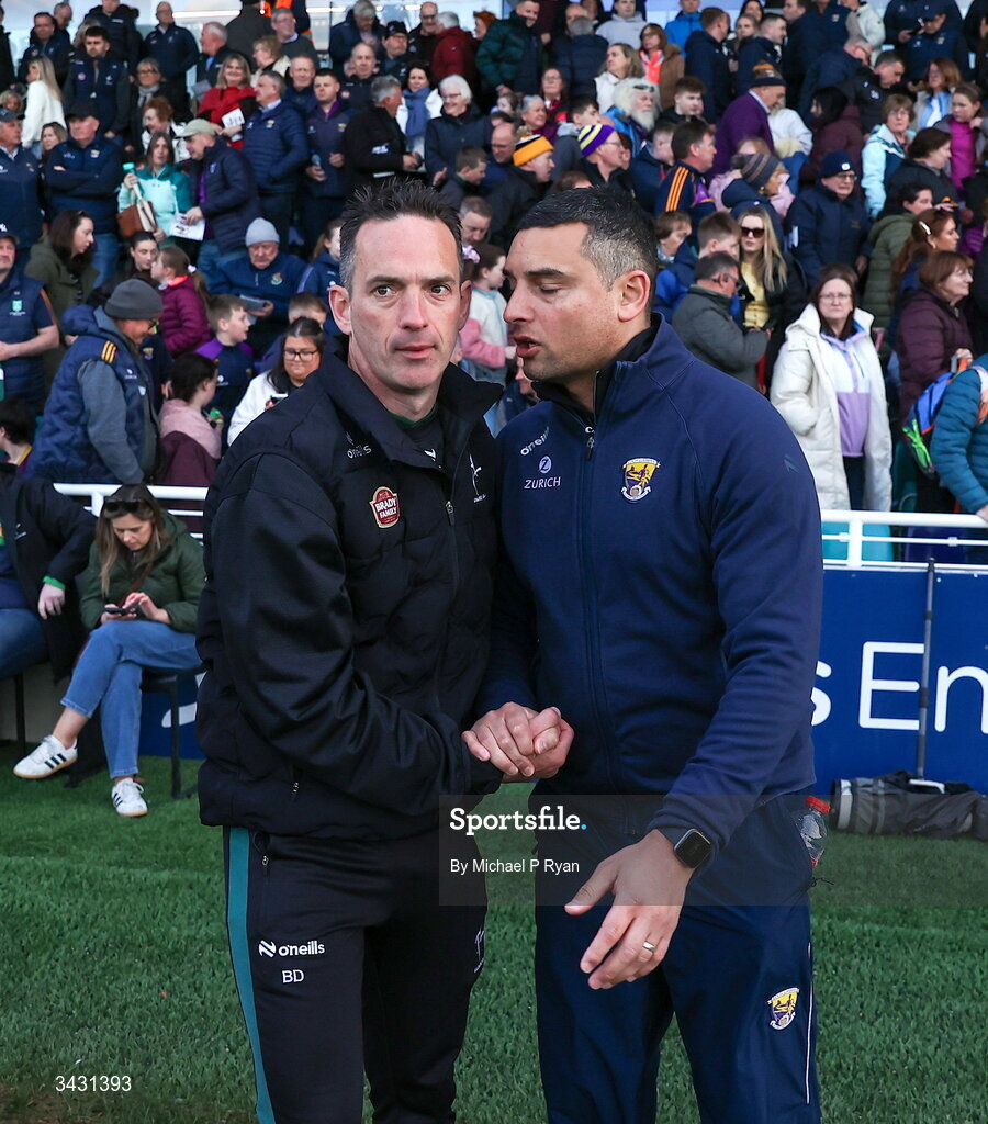 18 April 2026; Kildare manager Brian Dowling, left, shakes hands with Wexford manager Keith Rossiter after the Leinster GAA Senior Hurling Championship Round 1 match between Kildare and Wexford at Cedral St Conleth's Park in Newbridge, Kildare. Photo by Michael P Ryan/Sportsfile