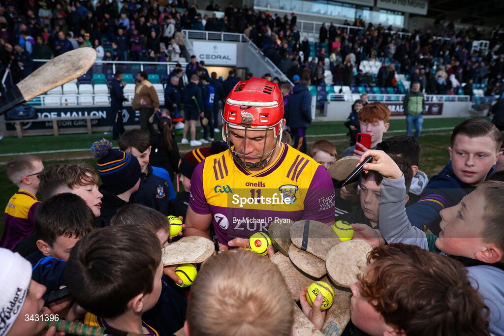 18 April 2026; Lee Chin of Wexford signs autographs for young supporters after the Leinster GAA Senior Hurling Championship Round 1 match between Kildare and Wexford at Cedral St Conleth's Park in Newbridge, Kildare. Photo by Michael P Ryan/Sportsfile