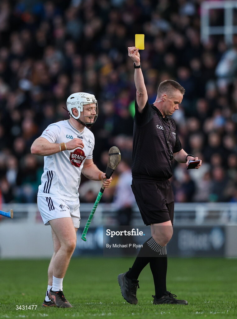 18 April 2026; Muiris Curtin of Kildare is shown a yellow card by referee Michael Kennedy during the Leinster GAA Senior Hurling Championship Round 1 match between Kildare and Wexford at Cedral St Conleth's Park in Newbridge, Kildare. Photo by Michael P Ryan/Sportsfile