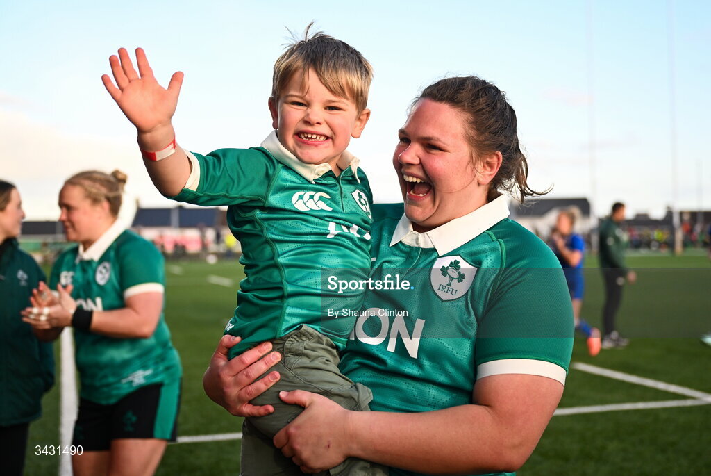 18 April 2026; Ellena Perry of Ireland and her son Bert after the Women's Six Nations Rugby Championship match between Ireland and Italy at Dexcom Stadium in Galway. Photo by Shauna Clinton/Sportsfile