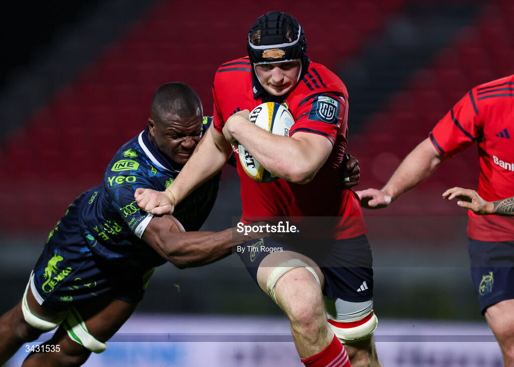 18 April 2026; Gavin Coombes of Munster is tackled by Alessandro Izekor of Benetton during the United Rugby Championship match between Benetton and Munster at Stadio Monigo in Treviso, Italy. Photo by Tim Rogers/Sportsfile