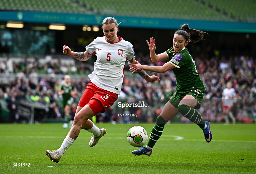 18 April 2026; Oliwia Wos of Poland in action against Marissa Sheva of Republic of Ireland during the 2027 FIFA Women’s World Cup Qualifier match between Republic of Ireland and Poland at the Aviva Stadium in Dublin. Photo by Seb Daly/Sportsfile