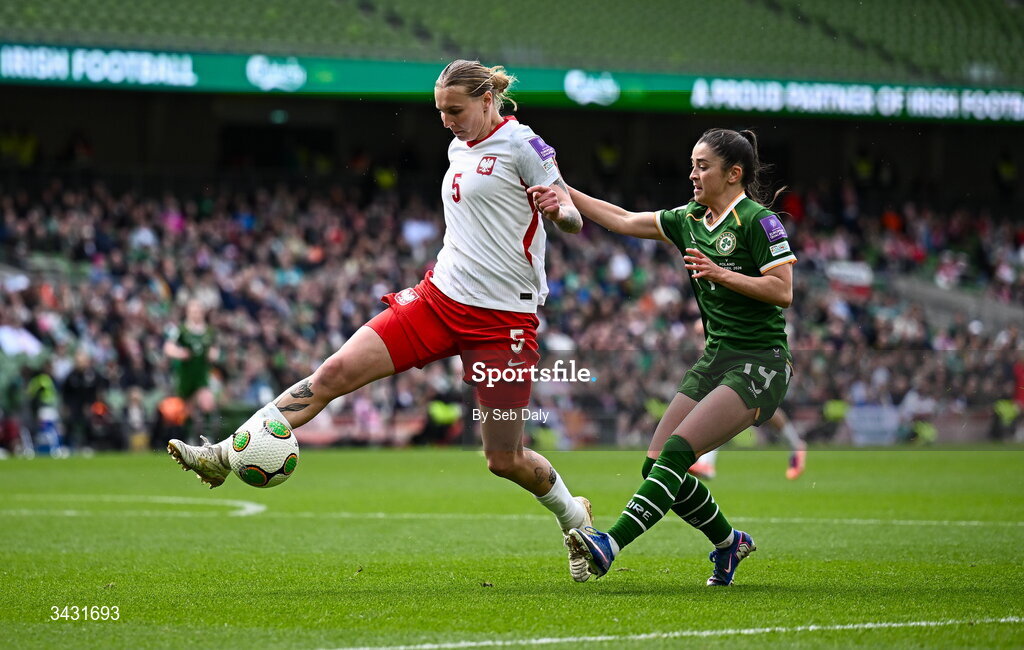 18 April 2026; Oliwia Wos of Poland in action against Marissa Sheva of Republic of Ireland during the 2027 FIFA Women’s World Cup Qualifier match between Republic of Ireland and Poland at the Aviva Stadium in Dublin. Photo by Seb Daly/Sportsfile
