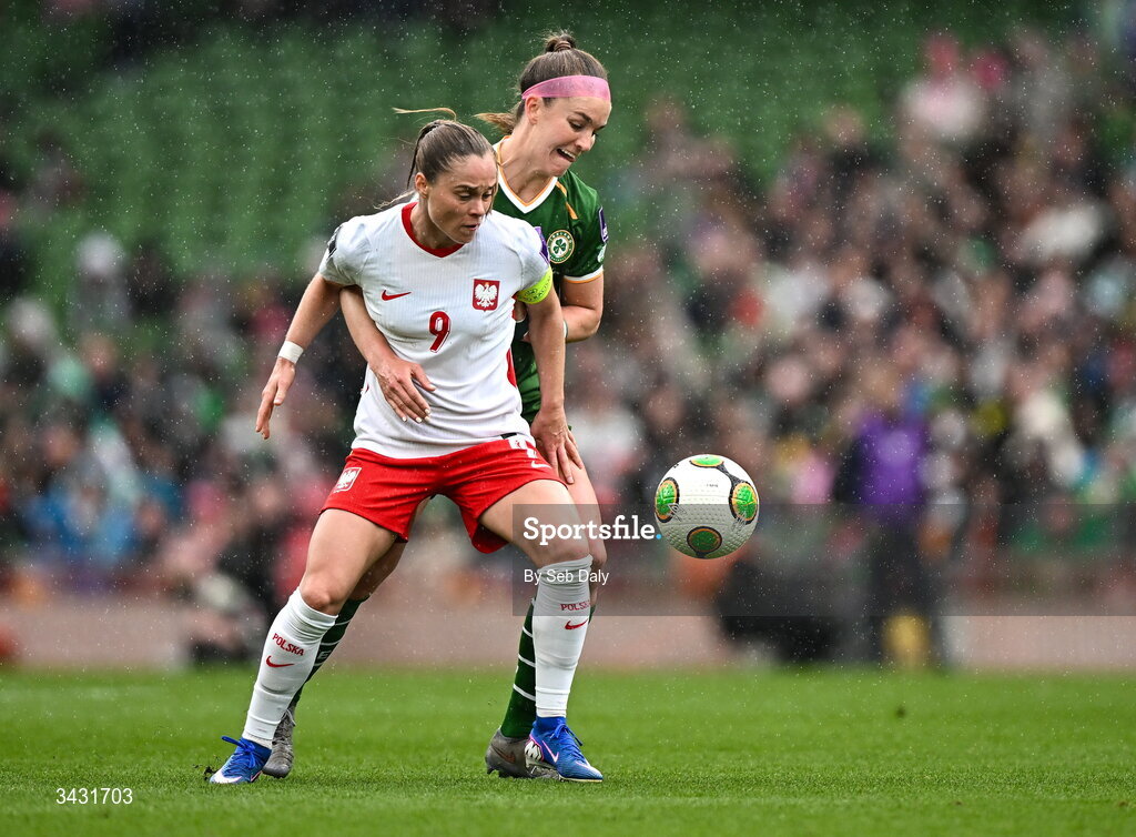 18 April 2026; Ewa Pajor of Poland in action against Caitlin Hayes of Republic of Ireland during the 2027 FIFA Women’s World Cup Qualifier match between Republic of Ireland and Poland at the Aviva Stadium in Dublin. Photo by Seb Daly/Sportsfile