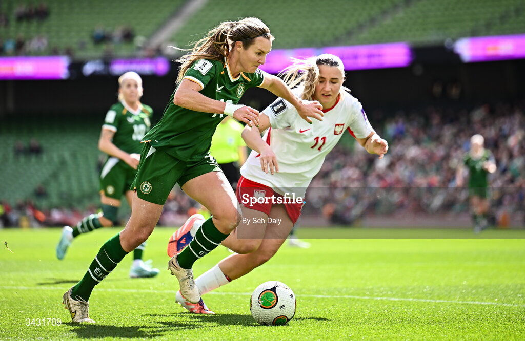 18 April 2026; Kyra Carusa of Republic of Ireland in action against Tanja Pawollek of Poland during the 2027 FIFA Women’s World Cup Qualifier match between Republic of Ireland and Poland at the Aviva Stadium in Dublin. Photo by Seb Daly/Sportsfile