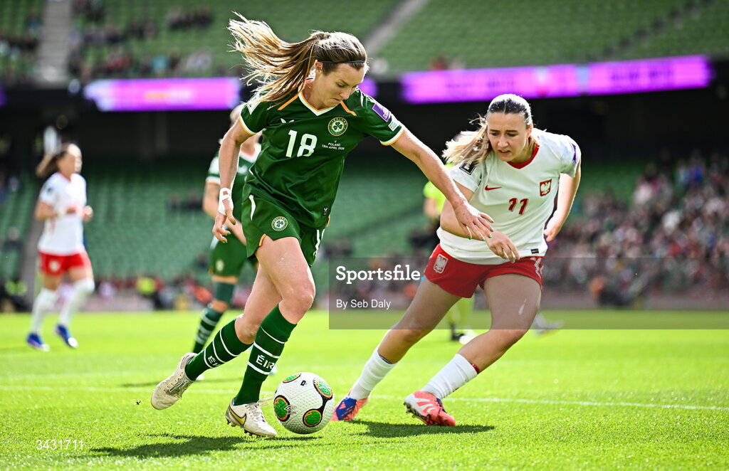 18 April 2026; Kyra Carusa of Republic of Ireland in action against Tanja Pawollek of Poland during the 2027 FIFA Women’s World Cup Qualifier match between Republic of Ireland and Poland at the Aviva Stadium in Dublin. Photo by Seb Daly/Sportsfile