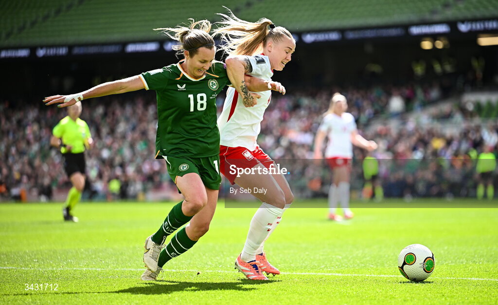 18 April 2026; Kyra Carusa of Republic of Ireland in action against Paulina Dudek of Poland during the 2027 FIFA Women’s World Cup Qualifier match between Republic of Ireland and Poland at the Aviva Stadium in Dublin. Photo by Seb Daly/Sportsfile