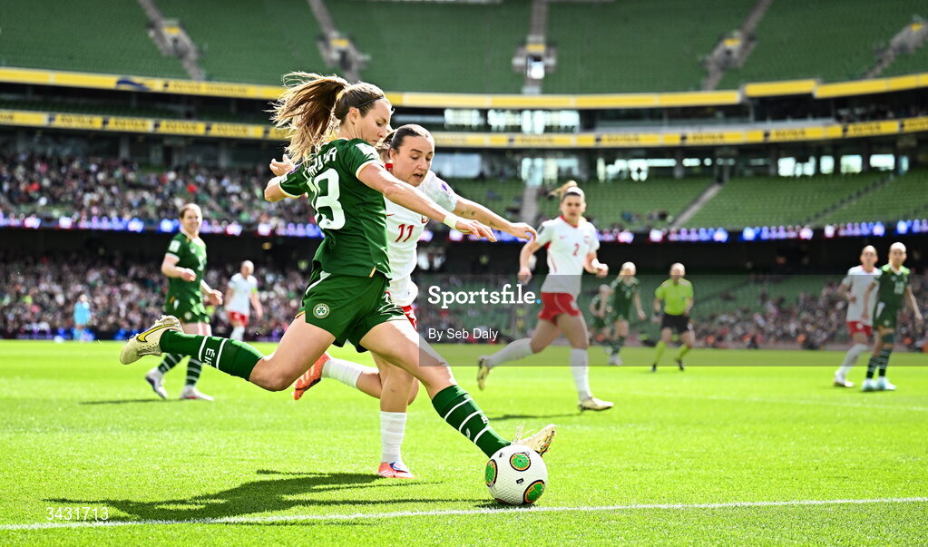 18 April 2026; Kyra Carusa of Republic of Ireland in action against Tanja Pawollek of Poland during the 2027 FIFA Women’s World Cup Qualifier match between Republic of Ireland and Poland at the Aviva Stadium in Dublin. Photo by Seb Daly/Sportsfile