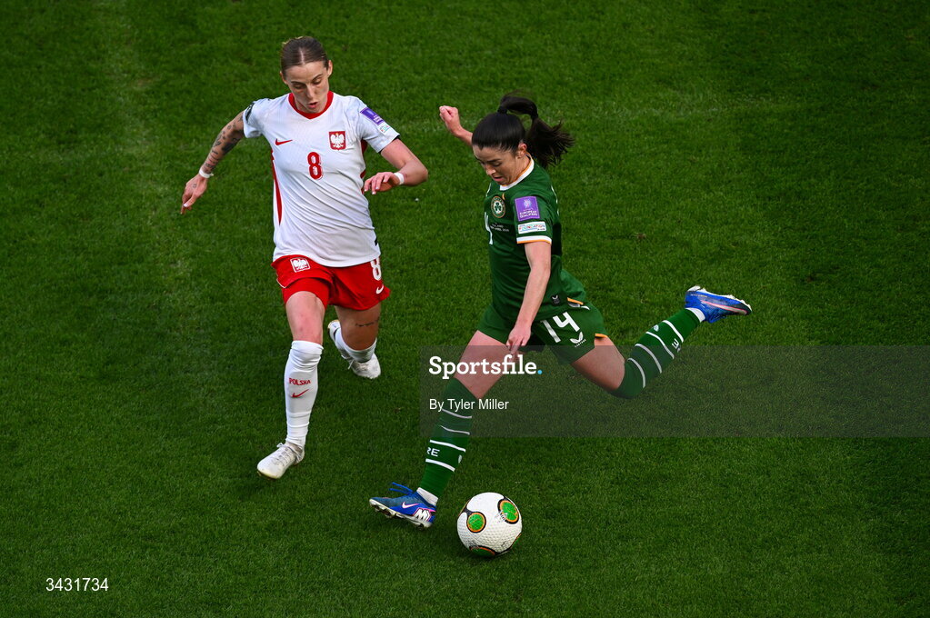 18 April 2026; Marissa Sheva of Republic of Ireland in action against Ewelina Kamczyk of Poland during the 2027 FIFA Women’s World Cup Qualifier match between Republic of Ireland and Poland at the Aviva Stadium in Dublin. Photo by Tyler Miller/Sportsfile