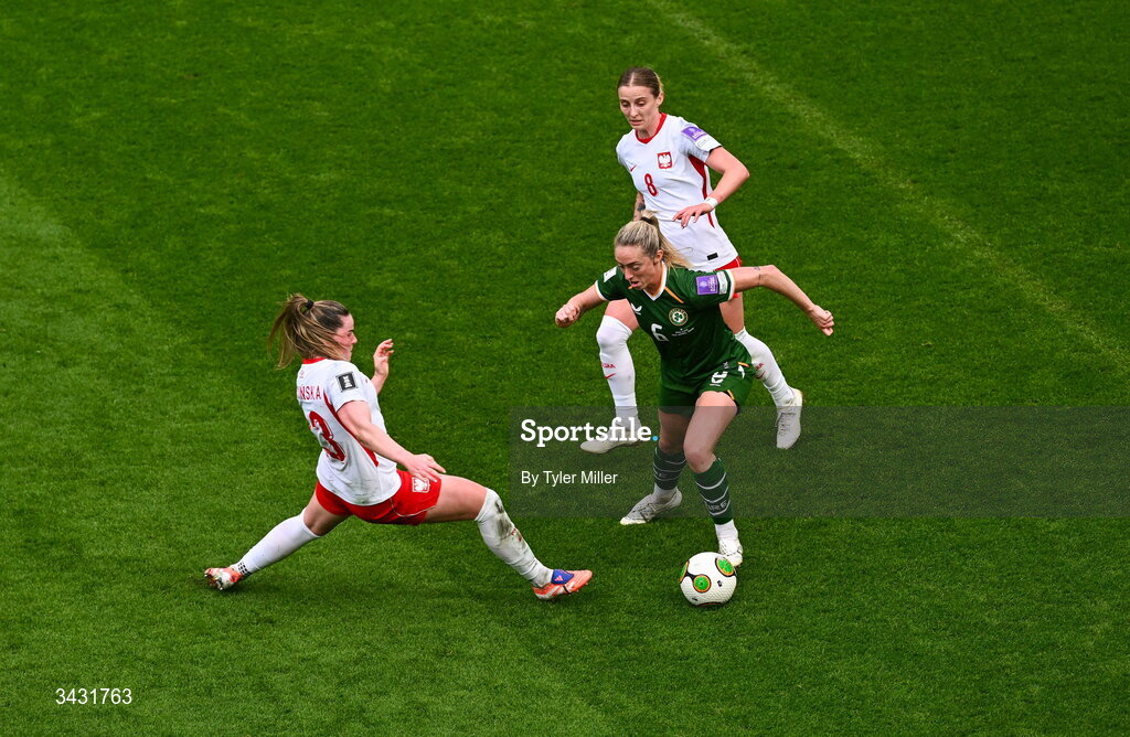 18 April 2026; Megan Connolly of Republic of Ireland in action against Adriana Achcinska, left, and Ewelina Kamczyk during the 2027 FIFA Women’s World Cup Qualifier match between Republic of Ireland and Poland at the Aviva Stadium in Dublin. Photo by Tyler Miller/Sportsfile