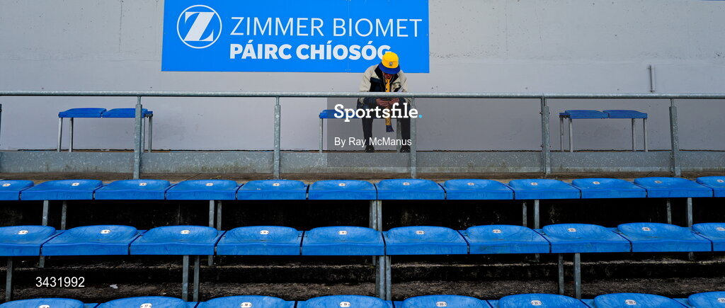 19 April 2026; Alone Clare supporter reads his programme before the Munster GAA Senior Hurling Championship Round 1 match between Clare and Waterford at Zimmer Biomet Páirc Chíosóg in Ennis, Clare. Photo by Ray McManus/Sportsfile
