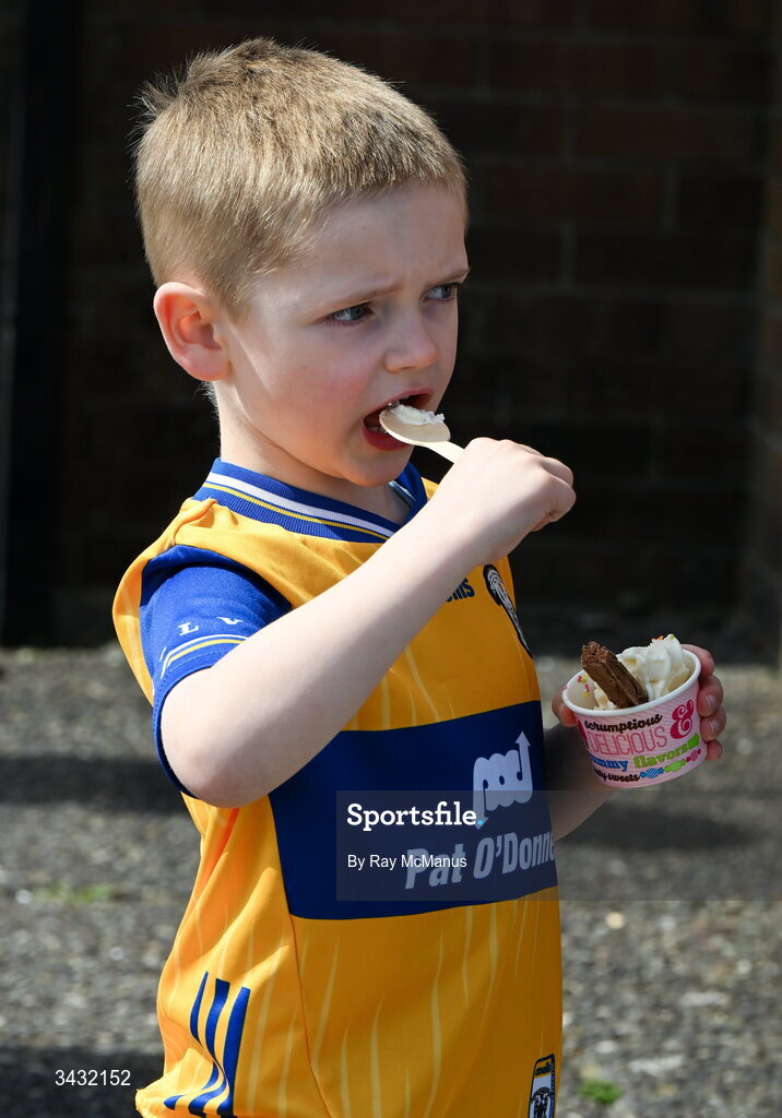 19 April 2026; Clare supporter Jack O'Connell, five years, from Crusheen eats an ice cream before the Munster GAA Senior Hurling Championship Round 1 match between Clare and Waterford at Zimmer Biomet Páirc Chíosóg in Ennis, Clare. Photo by Ray McManus/Sportsfile