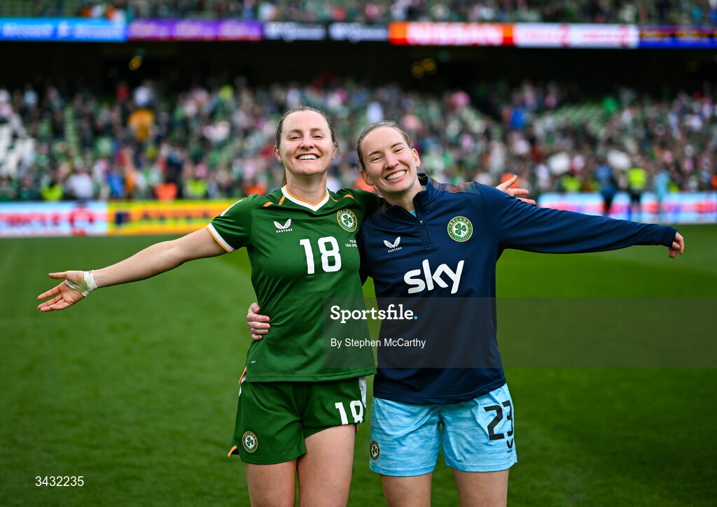 18 April 2026; Republic of Ireland's Kyra Carusa, left, and goalkeeper Sophie Whitehouse celebrate after the 2027 FIFA Women’s World Cup Qualifier match between Republic of Ireland and Poland at the Aviva Stadium in Dublin. Photo by Stephen McCarthy/Sportsfile