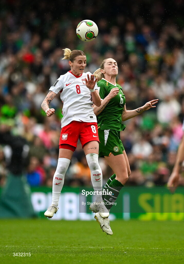 18 April 2026; Ewelina Kamczyk of Poland in action against Megan Connolly of Republic of Ireland during the 2027 FIFA Women’s World Cup Qualifier match between Republic of Ireland and Poland at the Aviva Stadium in Dublin. Photo by Stephen McCarthy/Sportsfile
