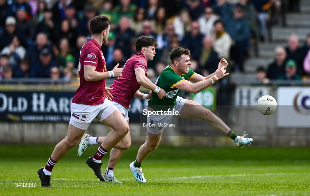 19 April 2026; Jack O'Connor of Meath in action against Daniel Scahill, centre, and Brían Cooney of Westmeath during the Leinster GAA Football Senior Championship quarter-final match between Meath and Westmeath at Glenisk O'Connor Park in Tullamore, Offaly. Photo by Ben McShane/Sportsfile