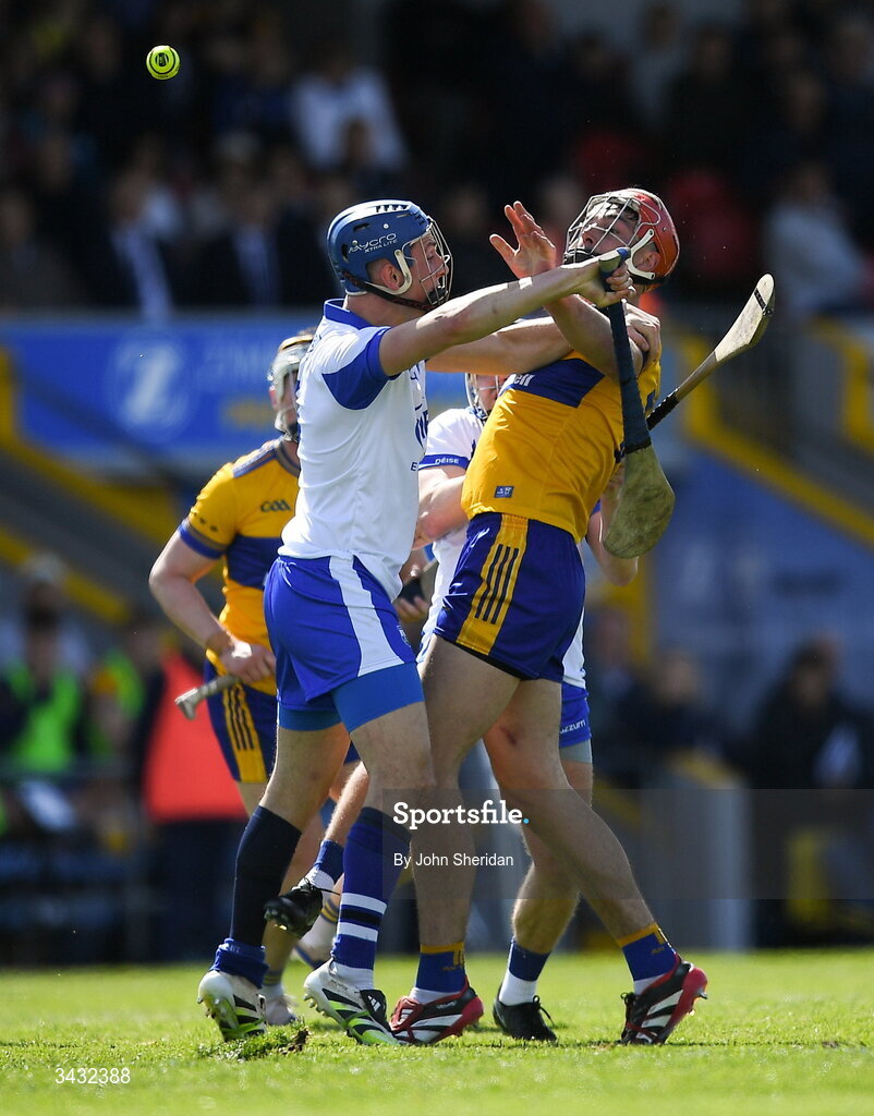 19 April 2026; Peter Duggan of Clare is tackled by Paddy Leavey of Waterford during the Munster GAA Senior Hurling Championship Round 1 match between Clare and Waterford at Zimmer Biomet Páirc Chíosóg in Ennis, Clare. Photo by John Sheridan/Sportsfile