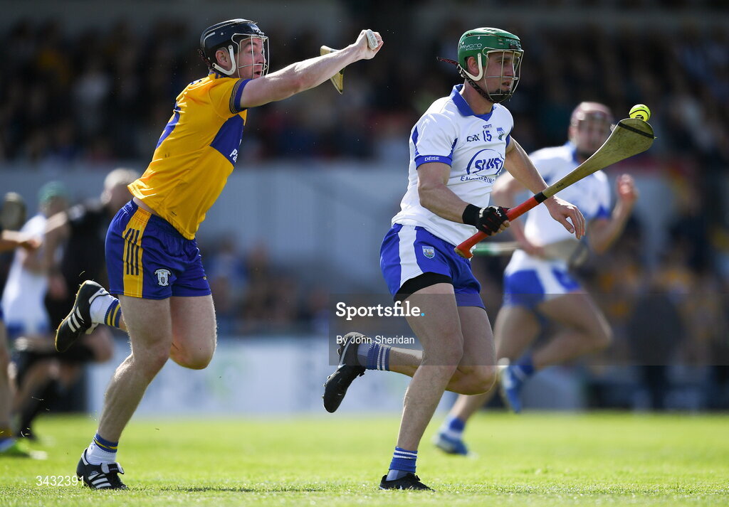 19 April 2026; Michael Kiely of Waterford in action against Tony Kelly of Clare during the Munster GAA Senior Hurling Championship Round 1 match between Clare and Waterford at Zimmer Biomet Páirc Chíosóg in Ennis, Clare. Photo by John Sheridan/Sportsfile