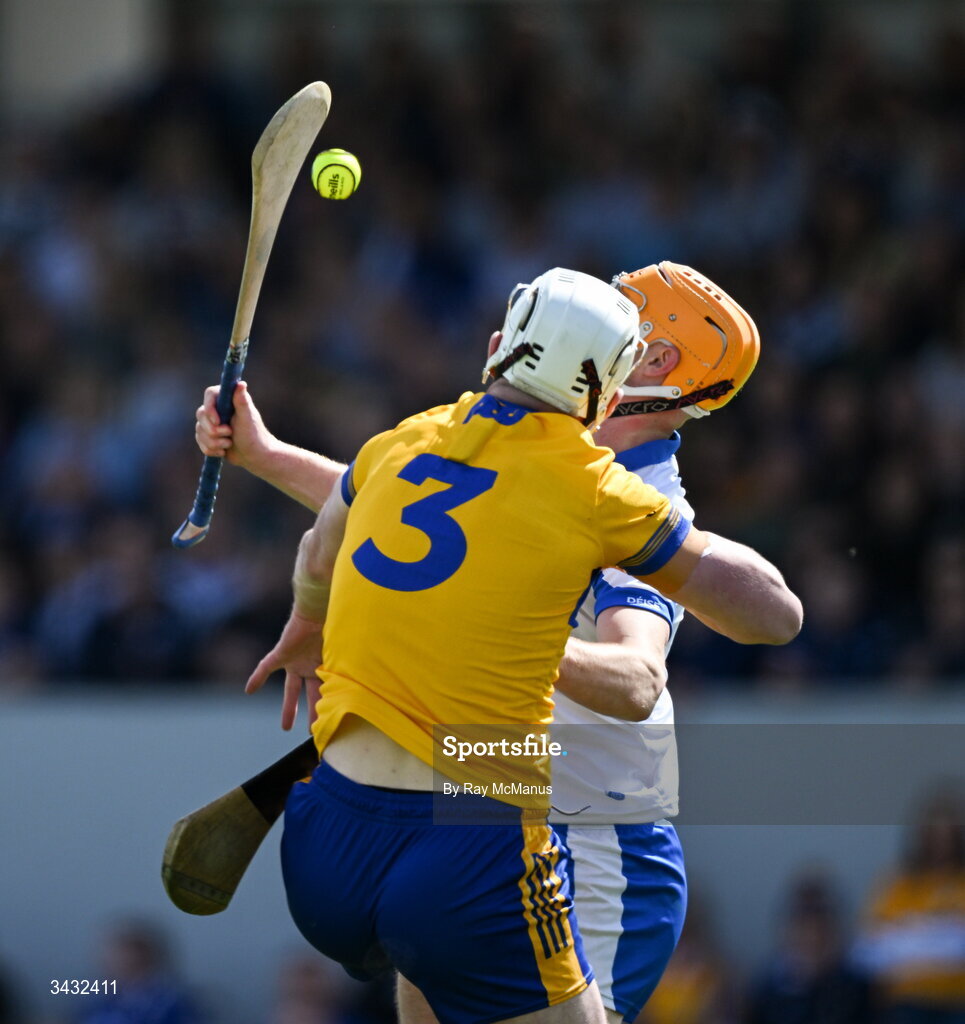 19 April 2026; Sean Walsh of Waterford is tackled by Conor Cleary of Clare during the Munster GAA Senior Hurling Championship Round 1 match between Clare and Waterford at Zimmer Biomet Páirc Chíosóg in Ennis, Clare. Photo by Ray McManus/Sportsfile