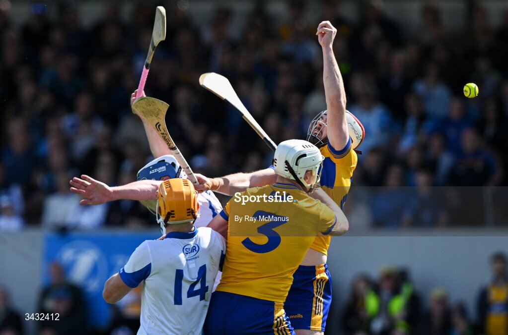 19 April 2026; Players from both sides, Conor Cleary and Conor Leen of Clare and Sean Walsh and Michael Kiely of Waterford, fail to catch the sliotar during the Munster GAA Senior Hurling Championship Round 1 match between Clare and Waterford at Zimmer Biomet Páirc Chíosóg in Ennis, Clare. Photo by Ray McManus/Sportsfile
