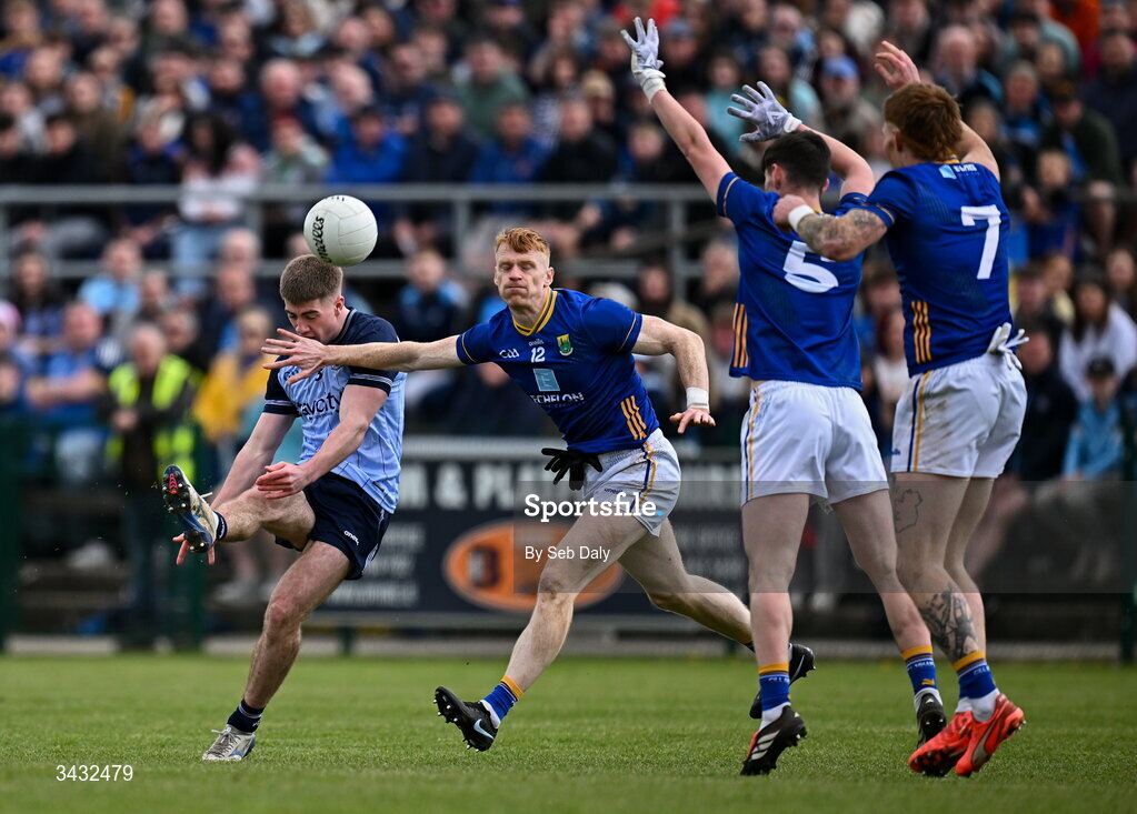 19 April 2026; Greg McEneaney of Dublin in action against Christopher O'Brien of Wicklow during the Leinster GAA Football Senior Championship quarter-final match between Wicklow and Dublin at Echelon Park in Aughrim in Wicklow. Photo by Seb Daly/Sportsfile