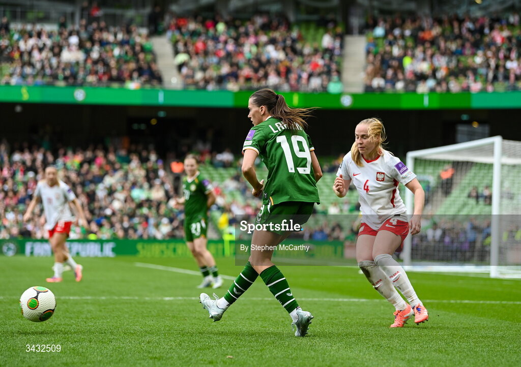 18 April 2026; Abbie Larkin of Republic of Ireland in action against Paulina Dudek of Poland during the 2027 FIFA Women’s World Cup Qualifier match between Republic of Ireland and Poland at the Aviva Stadium in Dublin. Photo by Stephen McCarthy/Sportsfile
