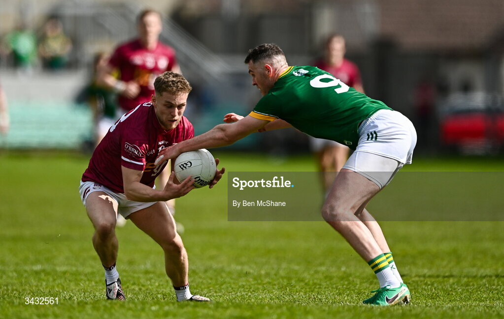 19 April 2026; Tom Molloy of Westmeath is tackled by Bryan Menton of Meath during the Leinster GAA Football Senior Championship quarter-final match between Meath and Westmeath at Glenisk O'Connor Park in Tullamore, Offaly. Photo by Ben McShane/Sportsfile