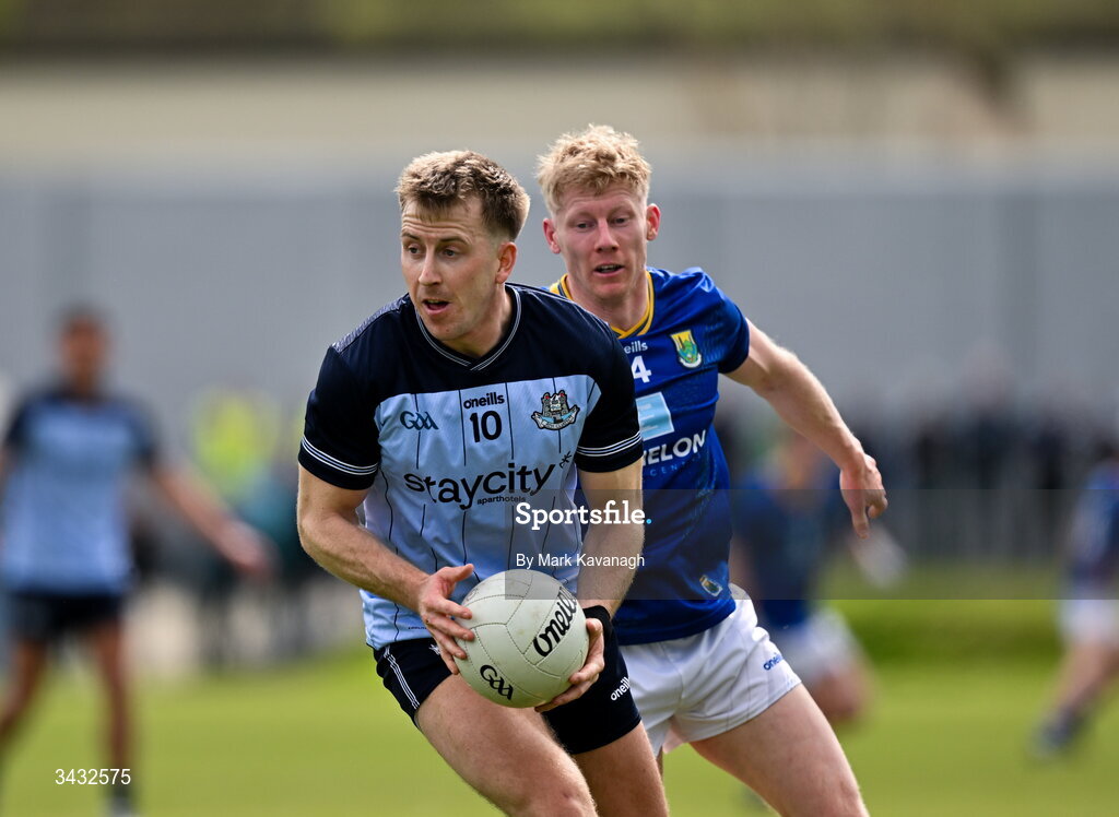 19 April 2026; Seán Bugler of Dublin in action against Gavin Fogarty of Wicklow during the Leinster GAA Football Senior Championship quarter-final match between Wicklow and Dublin at Echelon Park in Aughrim in Wicklow. Photo by Mark Kavanagh/Sportsfile