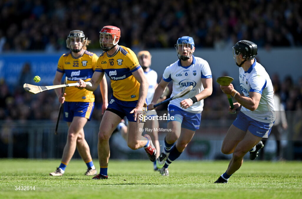 19 April 2026; Peter Duggan of Clare in action against Mark Fitzgerald of Waterford during the Munster GAA Senior Hurling Championship Round 1 match between Clare and Waterford at Zimmer Biomet Páirc Chíosóg in Ennis, Clare. Photo by Ray McManus/Sportsfile