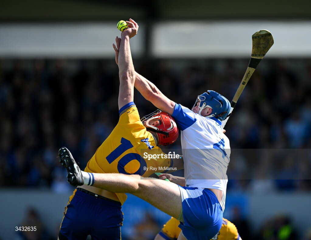 19 April 2026; Peter Duggan of Clare is tackled by Aaron O'Neill of Waterford during the Munster GAA Senior Hurling Championship Round 1 match between Clare and Waterford at Zimmer Biomet Páirc Chíosóg in Ennis, Clare. Photo by Ray McManus/Sportsfile
