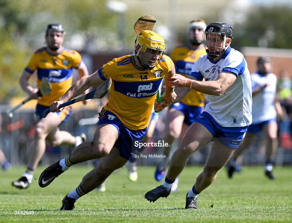 19 April 2026; Mark Rodgers of Clare is tackled by Ian Kenny of Waterford during the Munster GAA Senior Hurling Championship Round 1 match between Clare and Waterford at Zimmer Biomet Páirc Chíosóg in Ennis, Clare. Photo by Ray McManus/Sportsfile