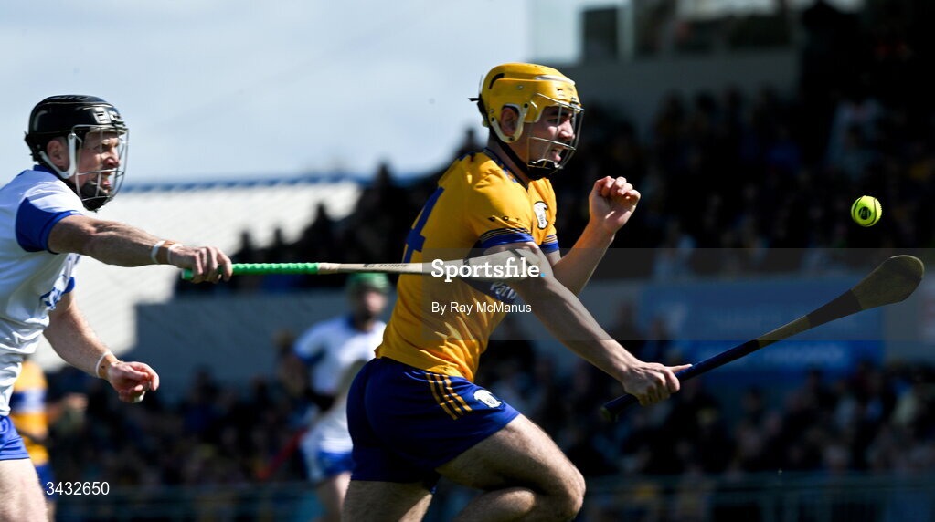 19 April 2026; Mark Rodgers of Clare is tackled by Ian Kenny of Waterford during the Munster GAA Senior Hurling Championship Round 1 match between Clare and Waterford at Zimmer Biomet Páirc Chíosóg in Ennis, Clare. Photo by Ray McManus/Sportsfile