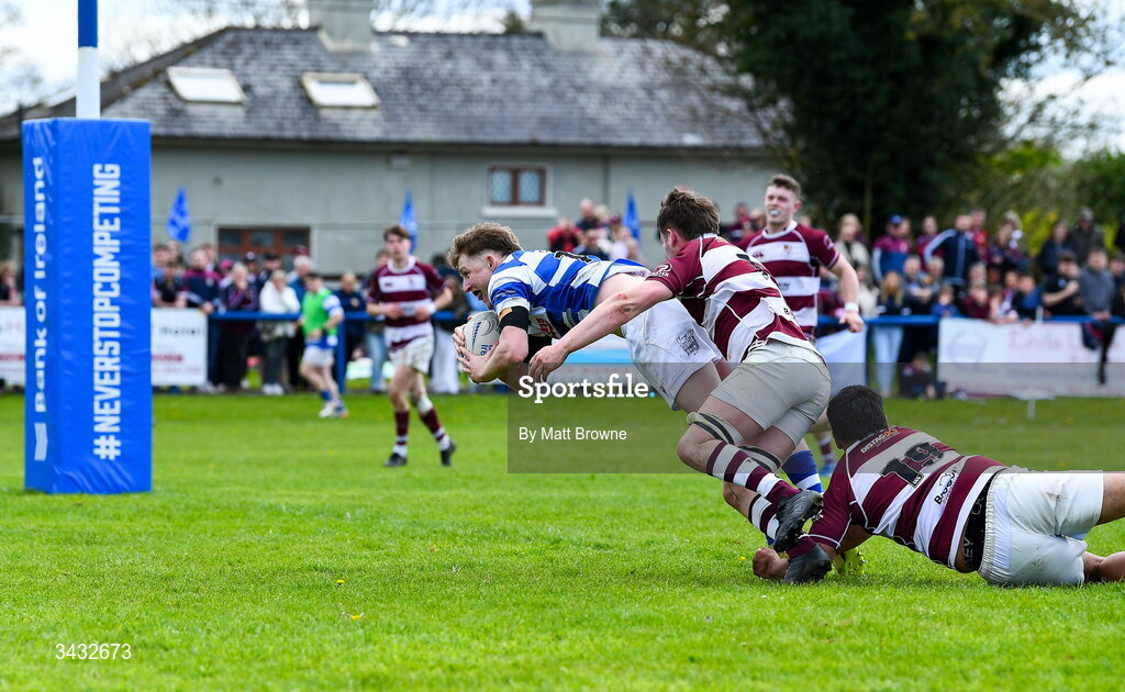 19 April 2026; Ciaran Fennessy of Athy RFC scores the second try despite the tackle of Fiach Byrne and Peter Burgess of Tullow RFC during the Bank of Ireland Provincial Towns Cup Final match between Athy RFC and Tullow RFC at Edenderry RFC in Edenderry, Offaly. Photo by Matt Browne/Sportsfile
