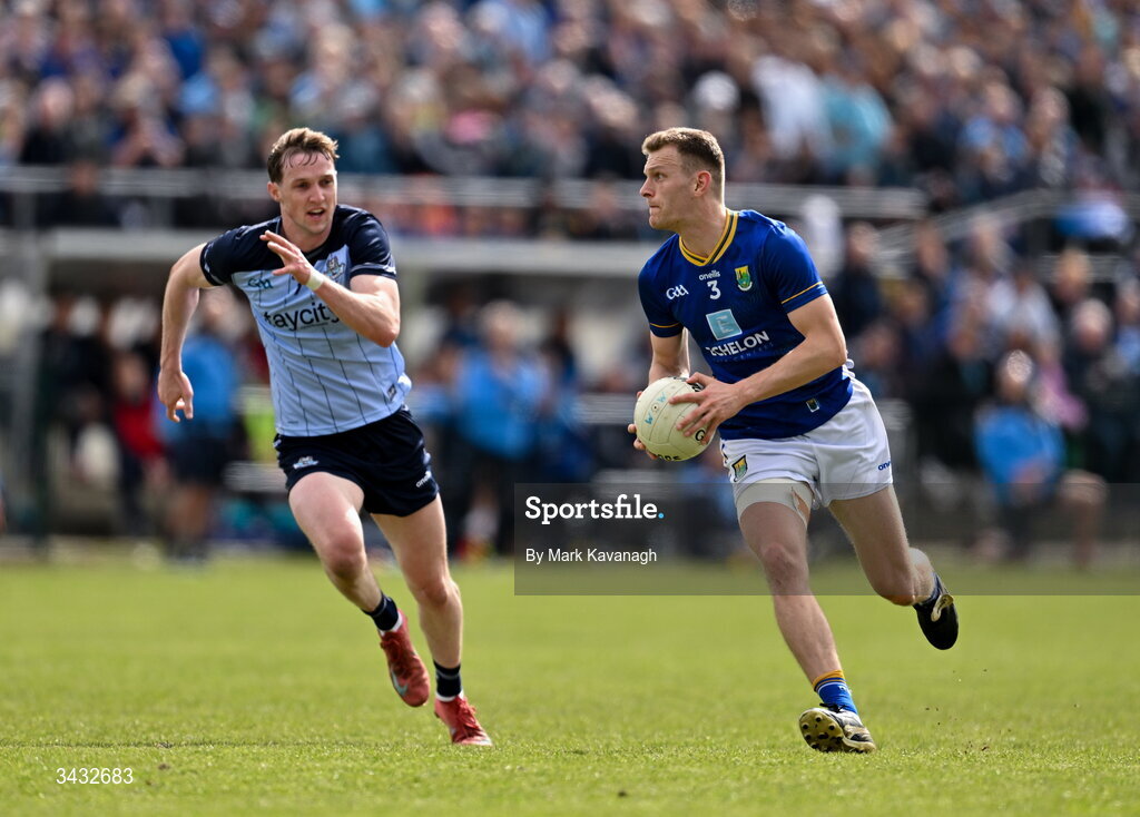 19 April 2026; Conall Ó Gallchobhair of Wicklow in action against Eoin Kennedy of Dublin during the Leinster GAA Football Senior Championship quarter-final match between Wicklow and Dublin at Echelon Park in Aughrim in Wicklow. Photo by Mark Kavanagh/Sportsfile