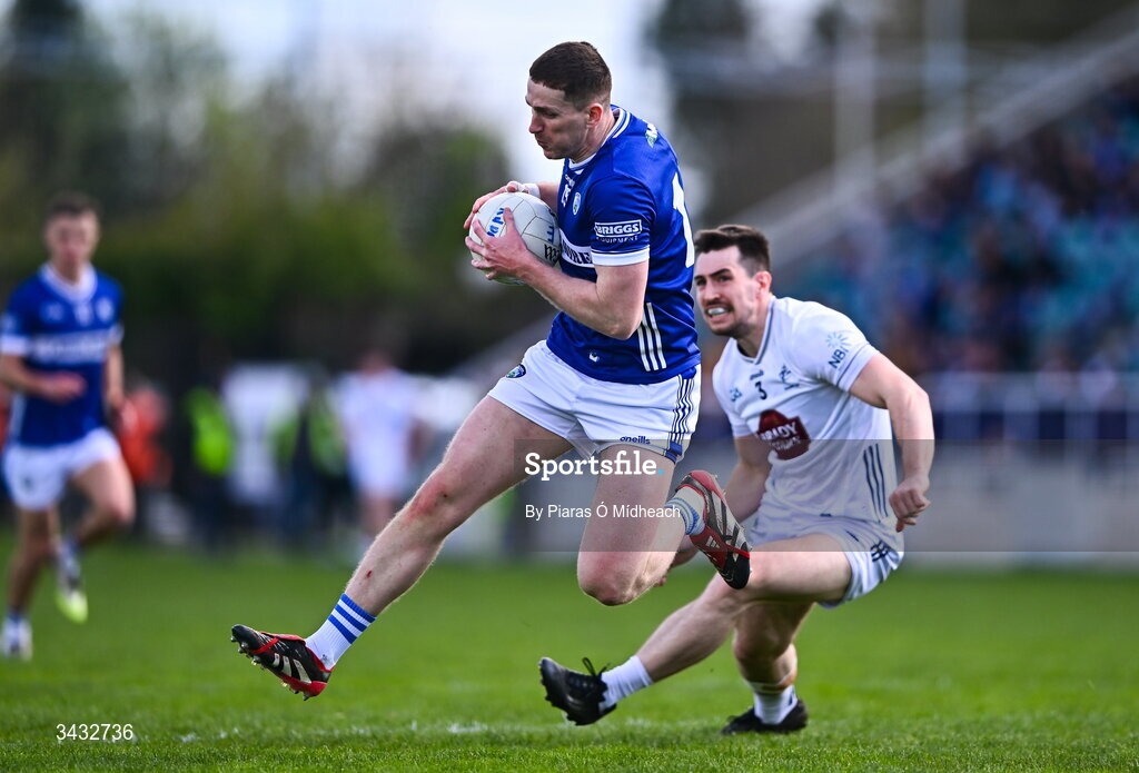 19 April 2026; Evan O'Carroll of Laois in action against Mark Dempsey of Kildare during the Leinster GAA Football Senior Championship quarter-final match between Kildare and Laois at Cedral St Conleths Park in Newbridge, Kildare. Photo by Piaras Ó Mídheach/Sportsfile
