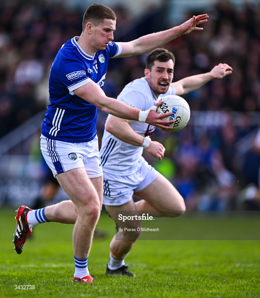 19 April 2026; Evan O'Carroll of Laois in action against Mark Dempsey of Kildare during the Leinster GAA Football Senior Championship quarter-final match between Kildare and Laois at Cedral St Conleths Park in Newbridge, Kildare. Photo by Piaras Ó Mídheach/Sportsfile