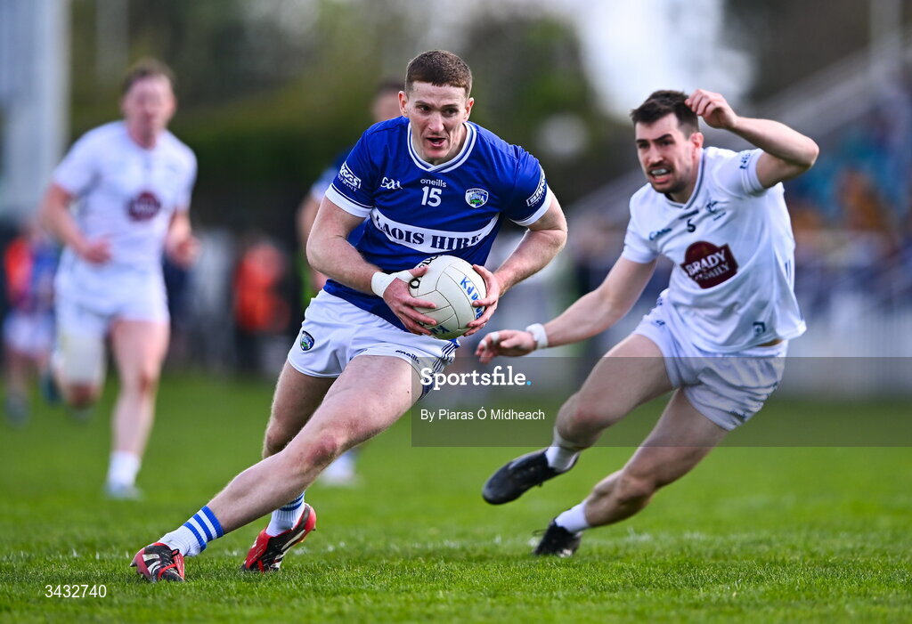 19 April 2026; Evan O'Carroll of Laois in action against Mark Dempsey of Kildare during the Leinster GAA Football Senior Championship quarter-final match between Kildare and Laois at Cedral St Conleths Park in Newbridge, Kildare. Photo by Piaras Ó Mídheach/Sportsfile