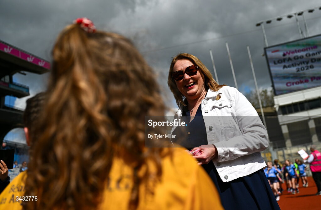 19 April 2026; LGFA President Trina Murray with Silverbridge Harps, Armagh, players during the 2026 LGFA Under 10 Go Games Festival Day at Croke Park in Dublin. Photo by Tyler Miller/Sportsfile