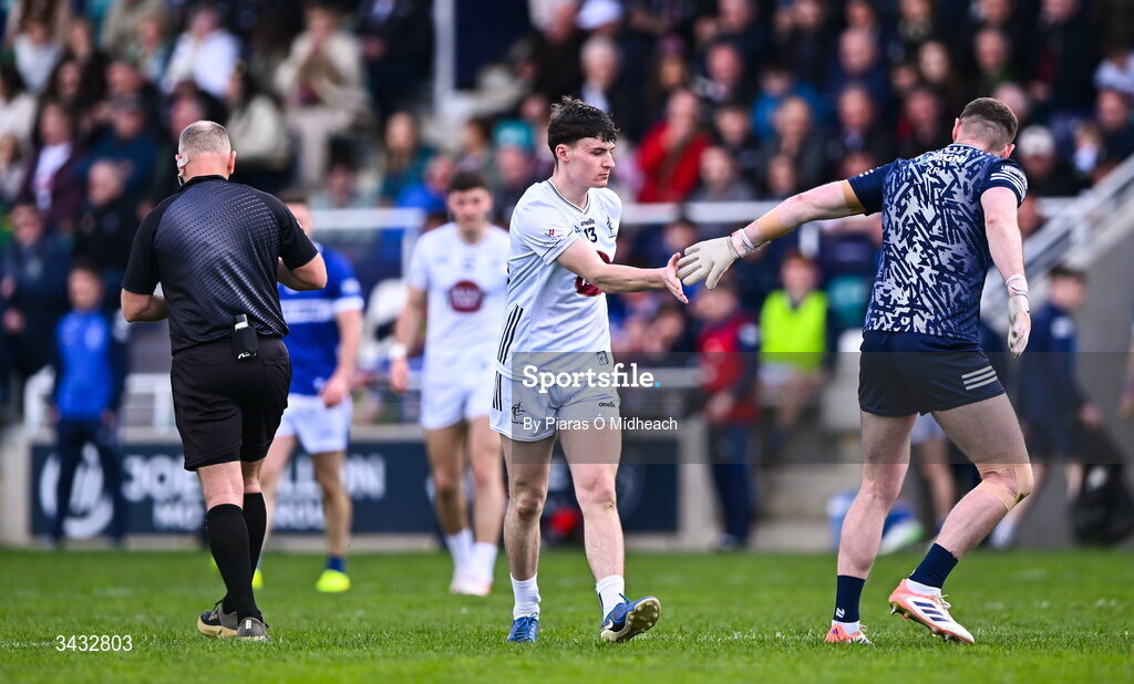 19 April 2026; Ben Loakman of Kildare and Laois goalkeeper Killian Roche after both were shown a yellow card by referee Conor Lane during the Leinster GAA Football Senior Championship quarter-final match between Kildare and Laois at Cedral St Conleths Park in Newbridge, Kildare. Photo by Piaras Ó Mídheach/Sportsfile