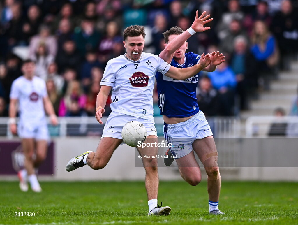 19 April 2026; Tommy Gill of Kildare in action against Conor Heffernan of Laois during the Leinster GAA Football Senior Championship quarter-final match between Kildare and Laois at Cedral St Conleths Park in Newbridge, Kildare. Photo by Piaras Ó Mídheach/Sportsfile