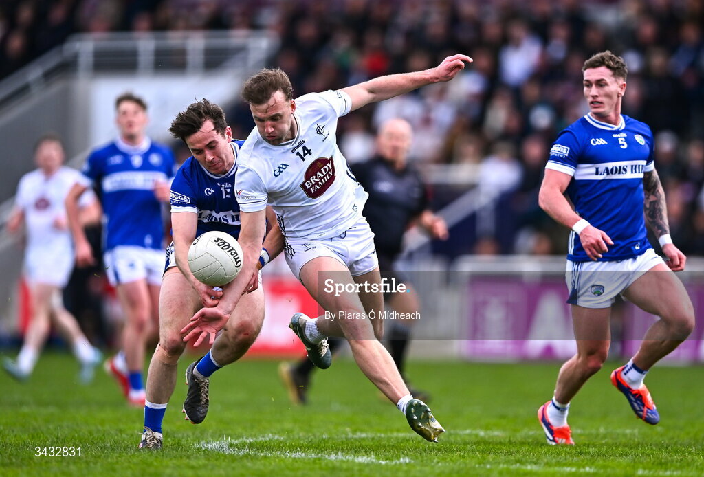 19 April 2026; Darragh Kirwan of Kildare in action against Trevor Collins of Laois during the Leinster GAA Football Senior Championship quarter-final match between Kildare and Laois at Cedral St Conleths Park in Newbridge, Kildare. Photo by Piaras Ó Mídheach/Sportsfile