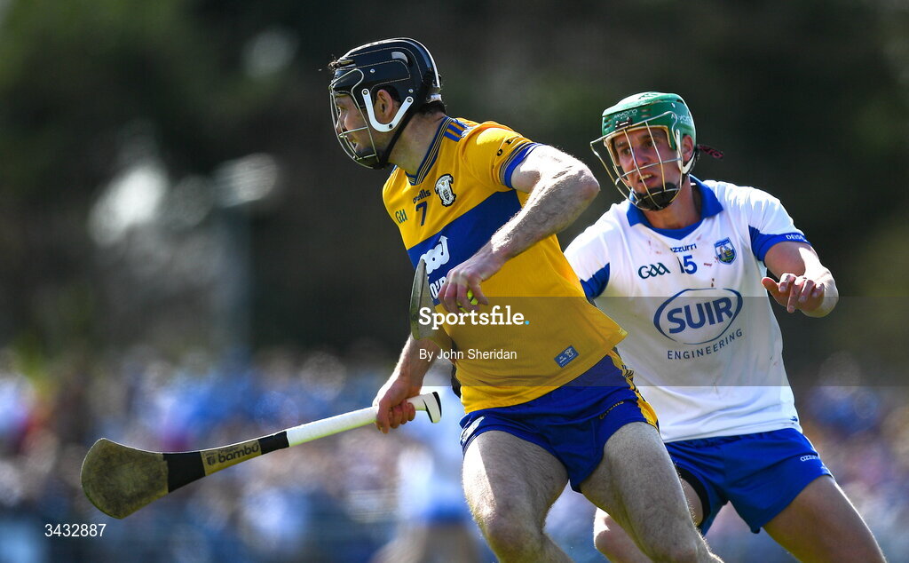 19 April 2026; Cathal Malone of Clare in action against Michael Kiely of Waterford during the Munster GAA Senior Hurling Championship Round 1 match between Clare and Waterford at Zimmer Biomet Páirc Chíosóg in Ennis, Clare. Photo by John Sheridan/Sportsfile