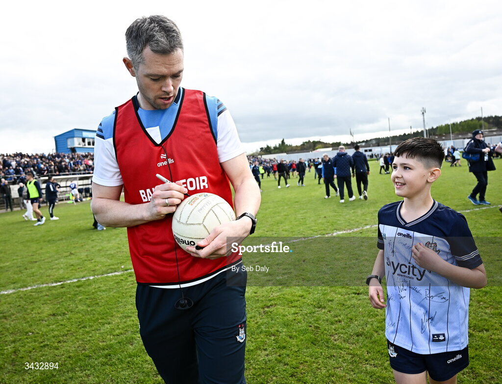 19 April 2026; Dublin selector Dean Rock signs a football for a young supporter after the Leinster GAA Football Senior Championship quarter-final match between Wicklow and Dublin at Echelon Park in Aughrim in Wicklow. Photo by Seb Daly/Sportsfile