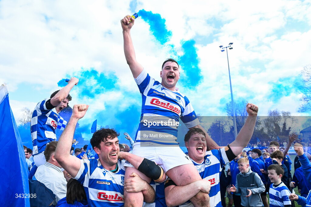 19 April 2026; Tom Sheedy of Athy RFC is held aloft by team-mate Tom Brady and John Sheedy after the Bank of Ireland Provincial Towns Cup Final match between Athy RFC and Tullow RFC at Edenderry RFC in Edenderry, Offaly. Photo by Matt Browne/Sportsfile