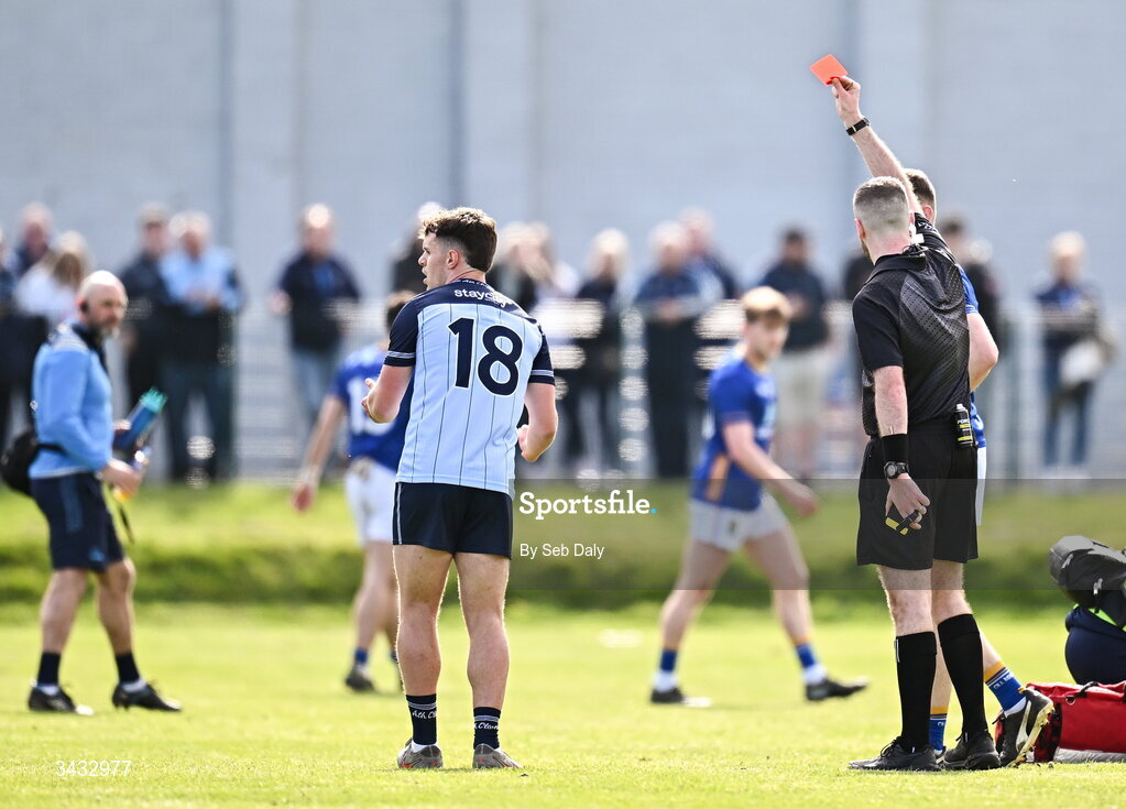19 April 2026; Referee Conor Dourneen shows a red card to Liam Smith of Dublin, left, during the Leinster GAA Football Senior Championship quarter-final match between Wicklow and Dublin at Echelon Park in Aughrim in Wicklow. Photo by Seb Daly/Sportsfile